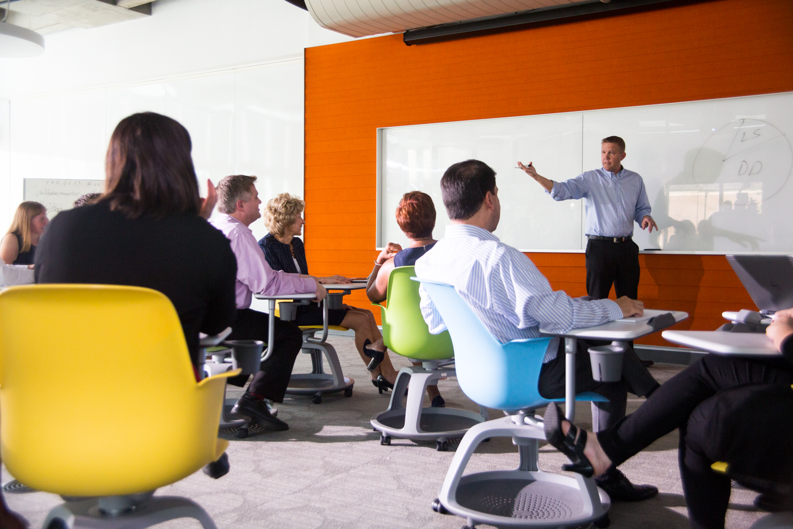 students in an executive hall classroom