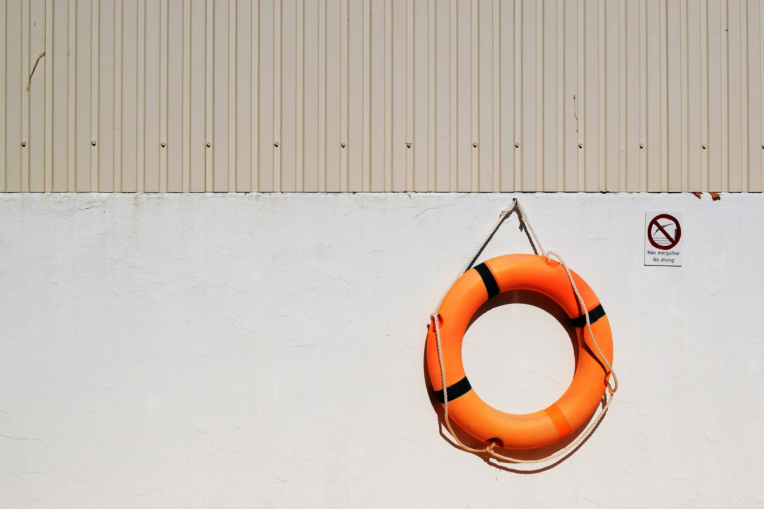 photon of boat lifesaver hanging on a wall